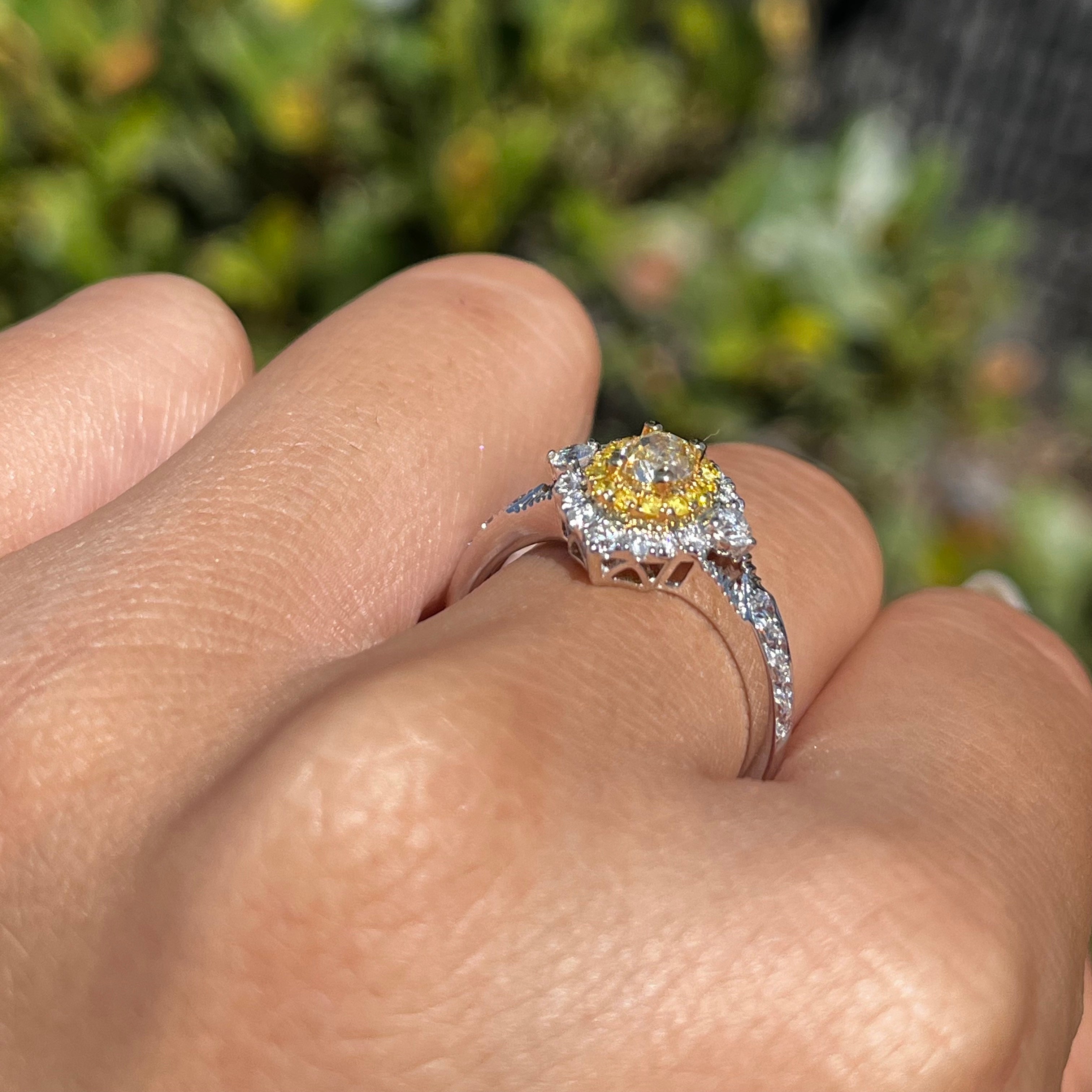 Two-Tone White and Yellow Oval Yellow Diamond Halo Art Deco Engagement Ring