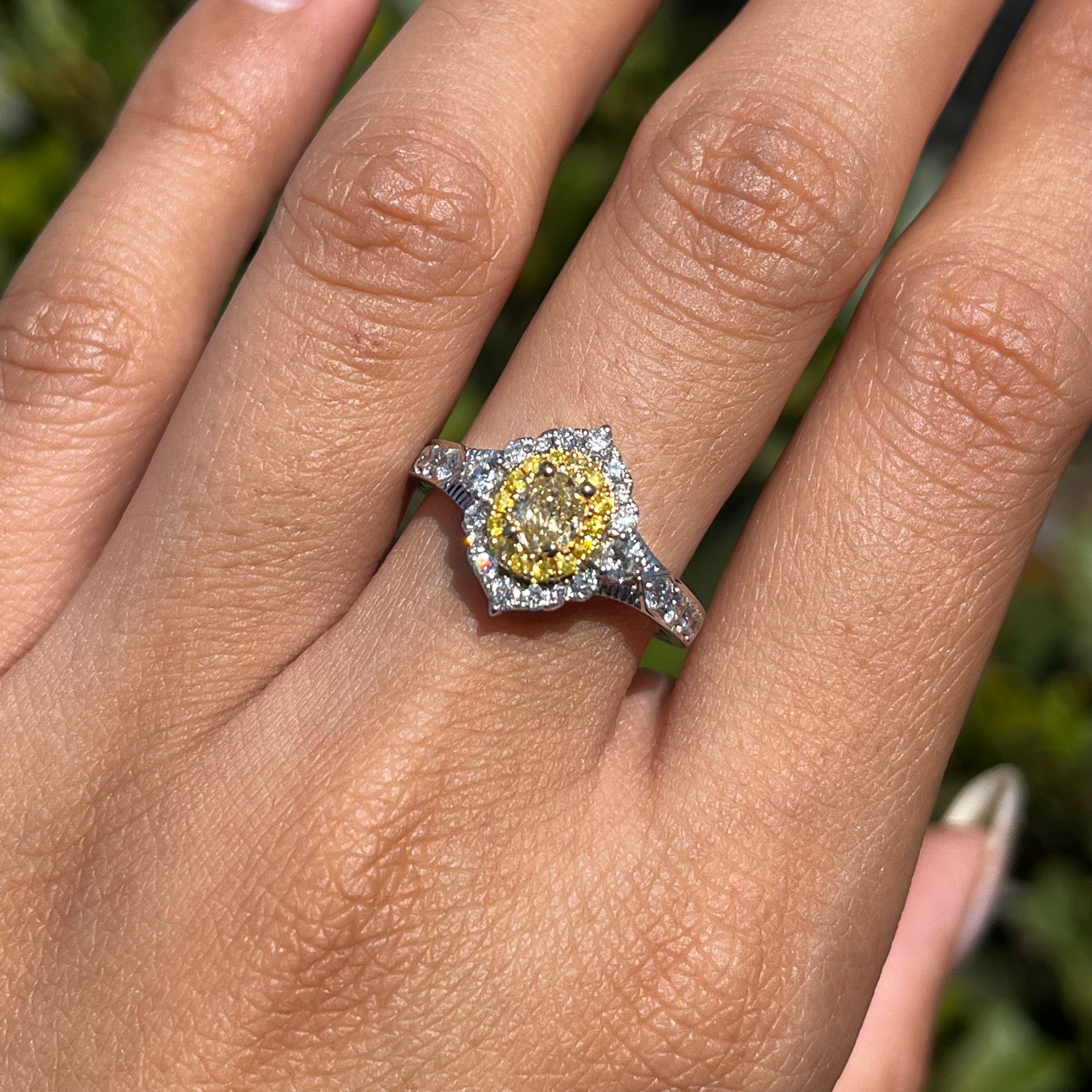 Two-Tone White and Yellow Oval Yellow Diamond Halo Art Deco Engagement Ring